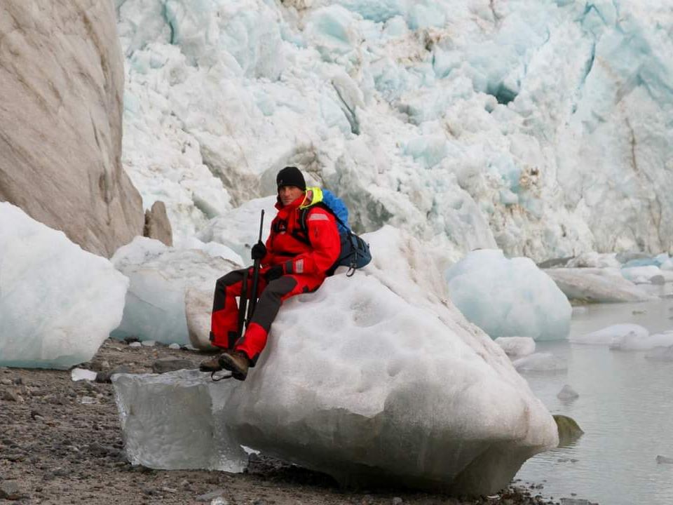 Resting on glacial ice at the foot of a glacier